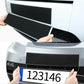 Black hook-and-loop fastener strip applied to a car front grille area