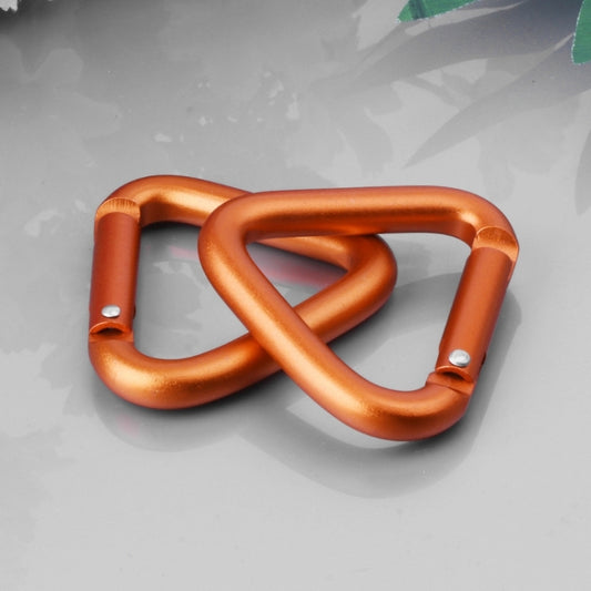 Orange triangle snap carabiner clip with metal spring latch, close-up