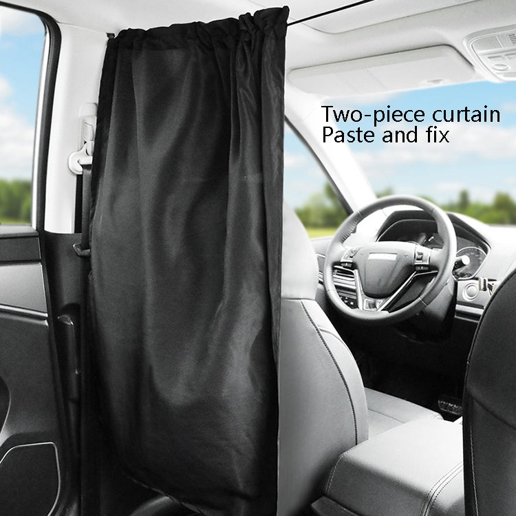 Black two-piece car privacy curtain draped over rear seat