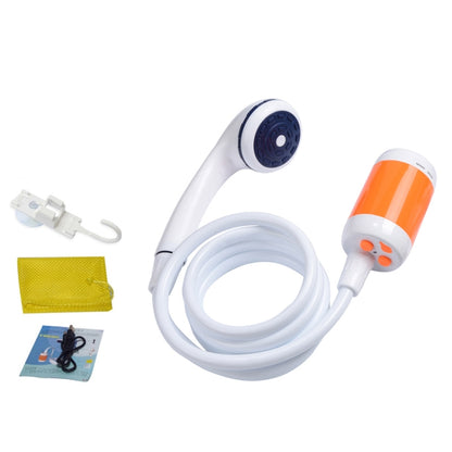 Orange and white electric pet shower kit with handheld nozzle and coiled hose