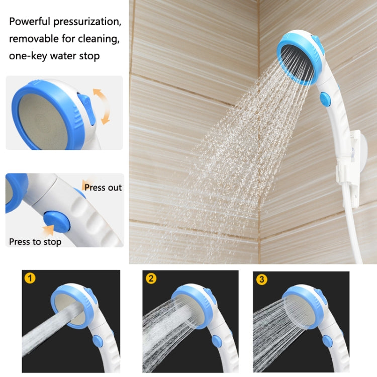 Blue handheld pet shower nozzle spraying water for cleaning