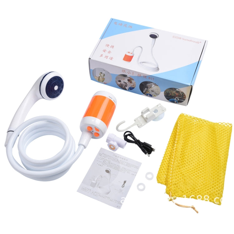Orange and white electric pet shower set with handheld sprayer, hose, and mesh bag