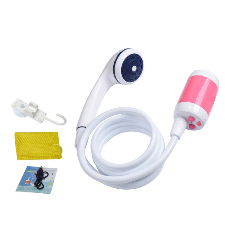 Pink and white electric pet shower kit with handheld nozzle and coiled hose