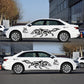 Black wolf totem decals on a white car door and rear quarter panel