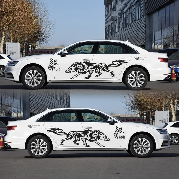 Black wolf totem decals on a white car door and rear quarter panel