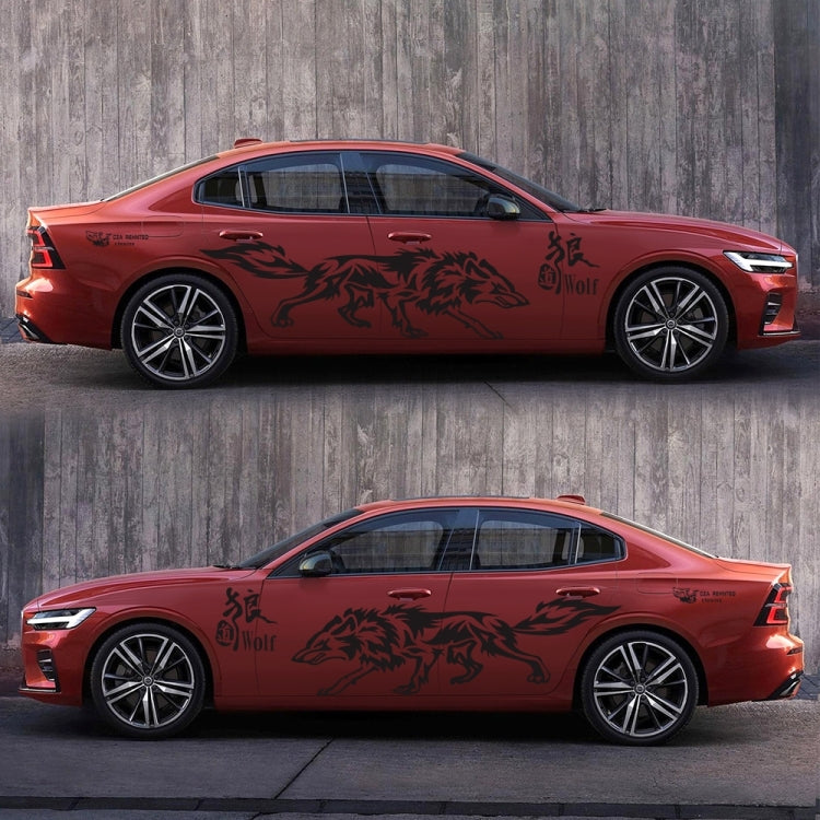 Black wolf totem decals on a red car door and rear quarter panel