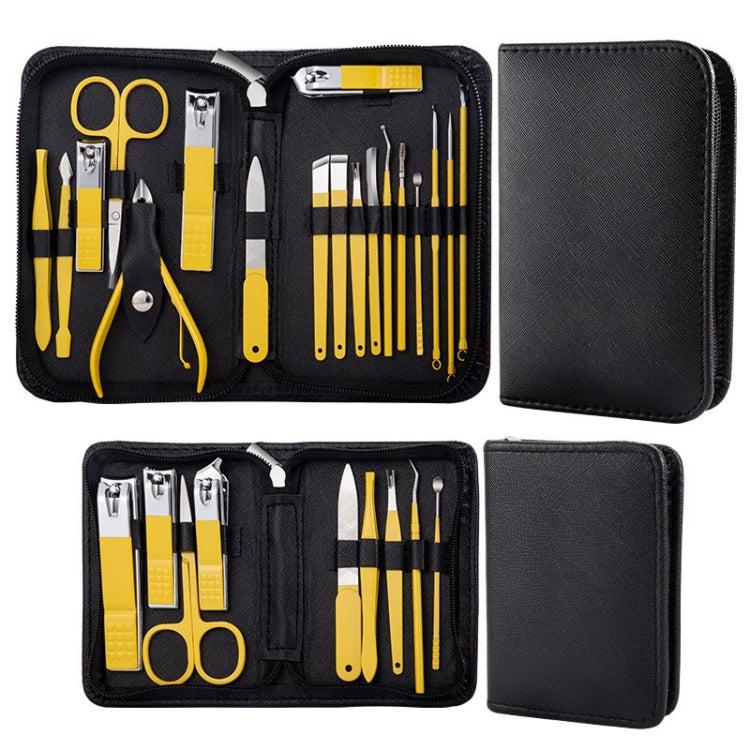 Nail clipper manicure tool set with yellow-handled tools in open black organizer case