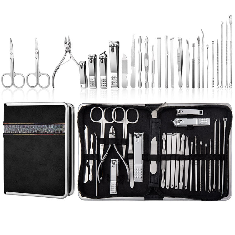 Manicure tool set with silver tools in black case, shown open with compartments