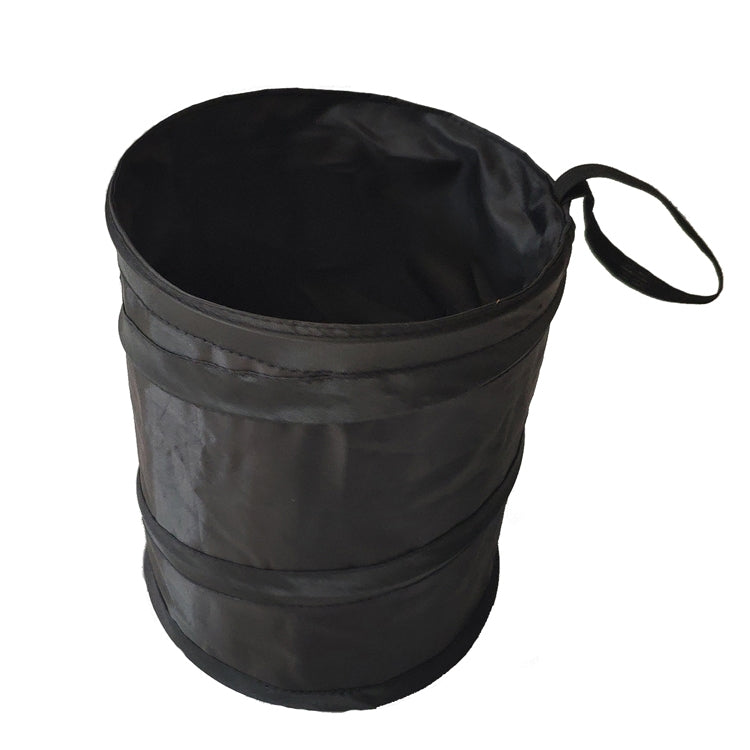 Foldable car trash bin with carrying handle, black fabric storage bag.