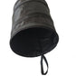 Foldable black trash bin with open rim and hanging drawstring handle.