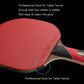 Close-up table tennis racket with red rubber face and wood blade edge detail