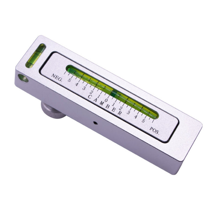 White magnetic tire camber adjustment level tool with green bubble vial and scale