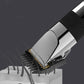 Rechargeable clipper close-up of metal blades under a dark guard