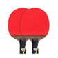 Table tennis racket with two red rubber surfaces and dark wood handle