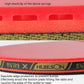 Table tennis racket red rubber close-up with textured sponge surface