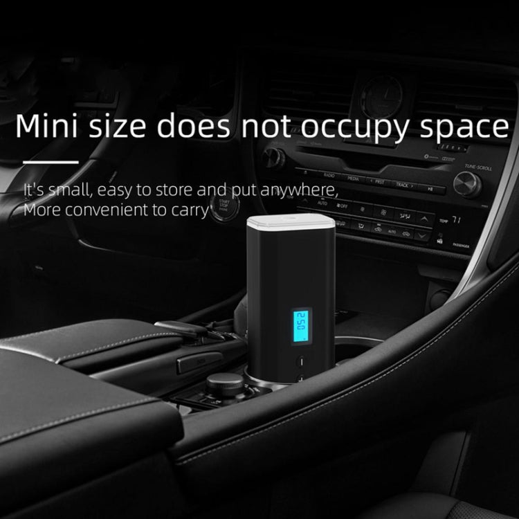 Compact wireless tire inflator pump standing in a car seat area