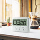 LCD countdown kitchen timer on countertop showing large time digits