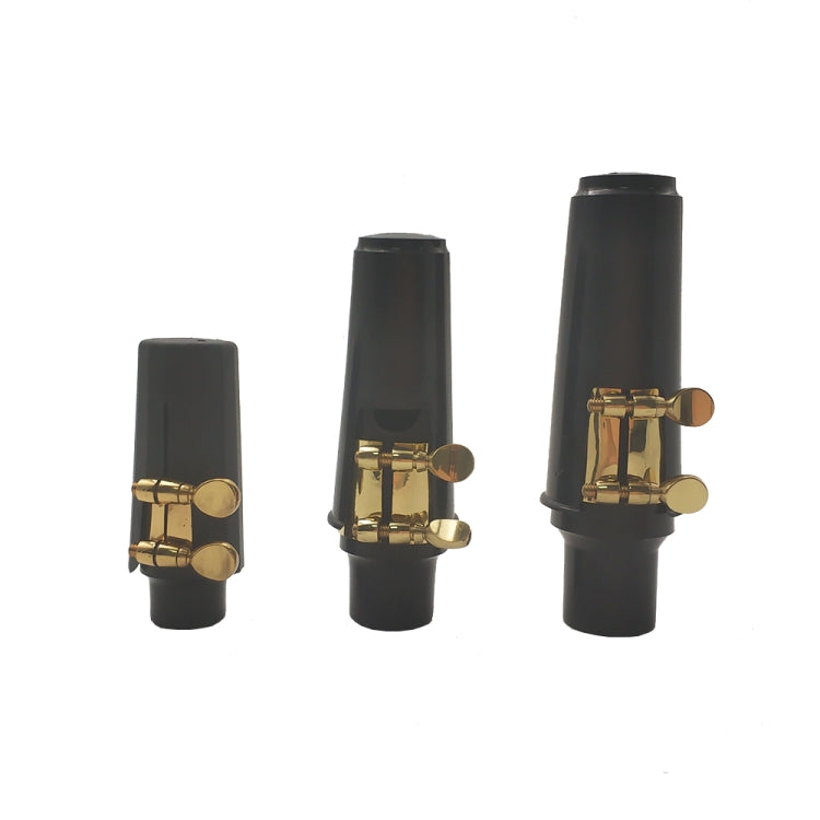 Set of black saxophone mouthpieces with gold-tone caps and clip hardware