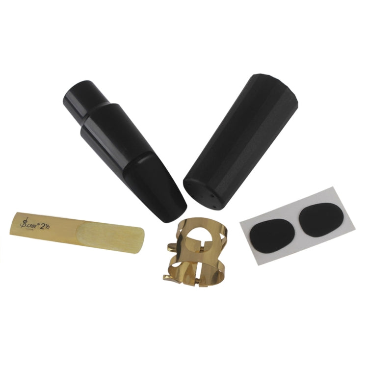 Saxophone mouthpiece accessories set: black mouthpieces, ligature, and reed