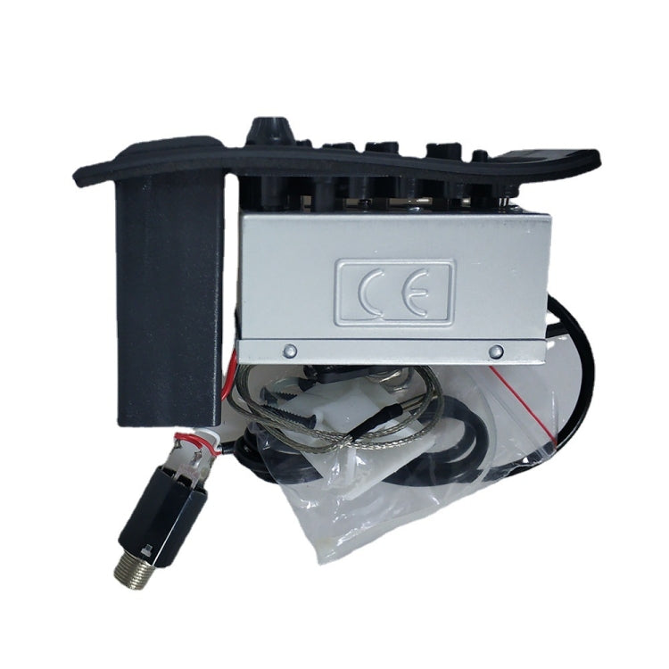 Four-band guitar equalizer module with silver face panel and cable connections