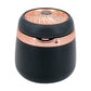 Mini car ashtray with cover closed, black body and rose-gold top with lamp circle