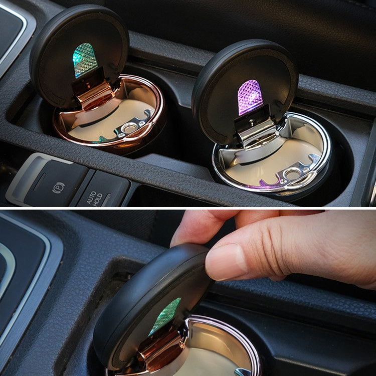 Two open mini car ashtrays with cigarette holders and colored indicator lights