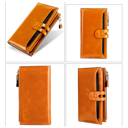 Tan leather long wallet with strap closure and stitched edges, front and back views.