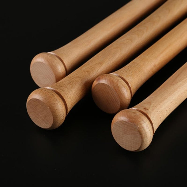 Close-up of natural wood baseball bat ends with visible grain