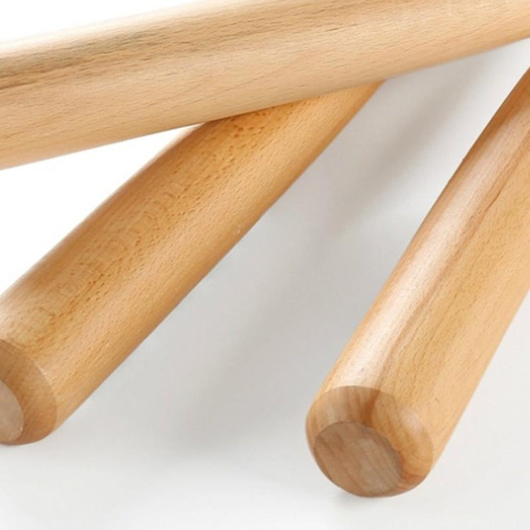 Two natural wood baseball bats showing rounded ends and smooth barrels