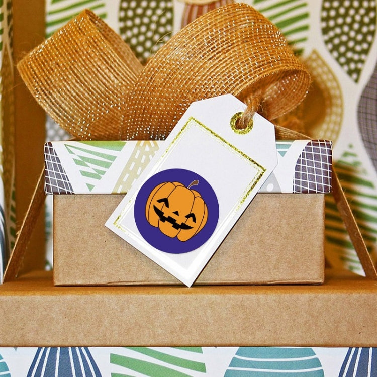 Halloween gift packaging with round pumpkin sticker on kraft box and white tag