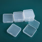 Set of small square clear plastic storage boxes with snap lids for parts