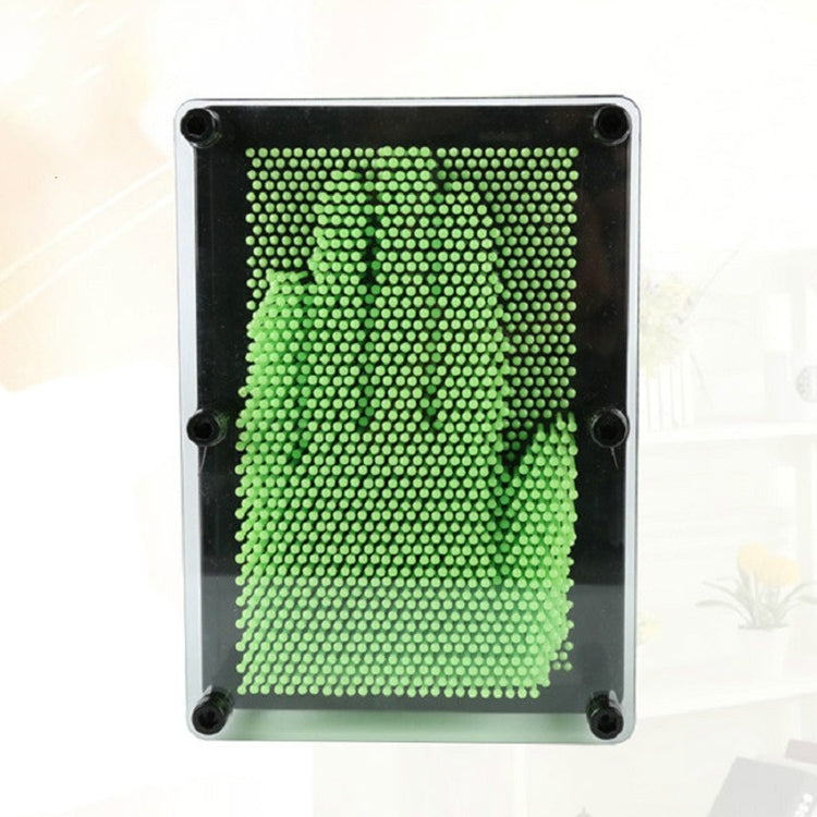 Green bead needle carving hand mold in clear square frame with black corner supports