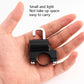 Black helmet lock in hand with silver shackle and circular lock body
