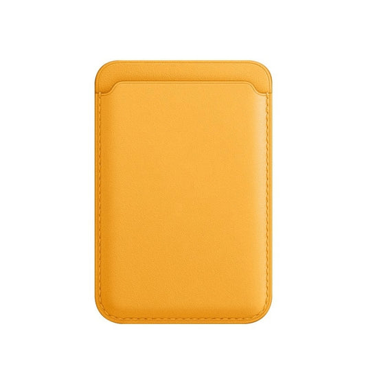 Golden yellow leather magnetic card case with stitched edges and slim square shape.