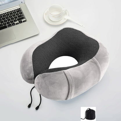 Gray U-shaped memory foam travel pillow with dark center panel and drawstring ties