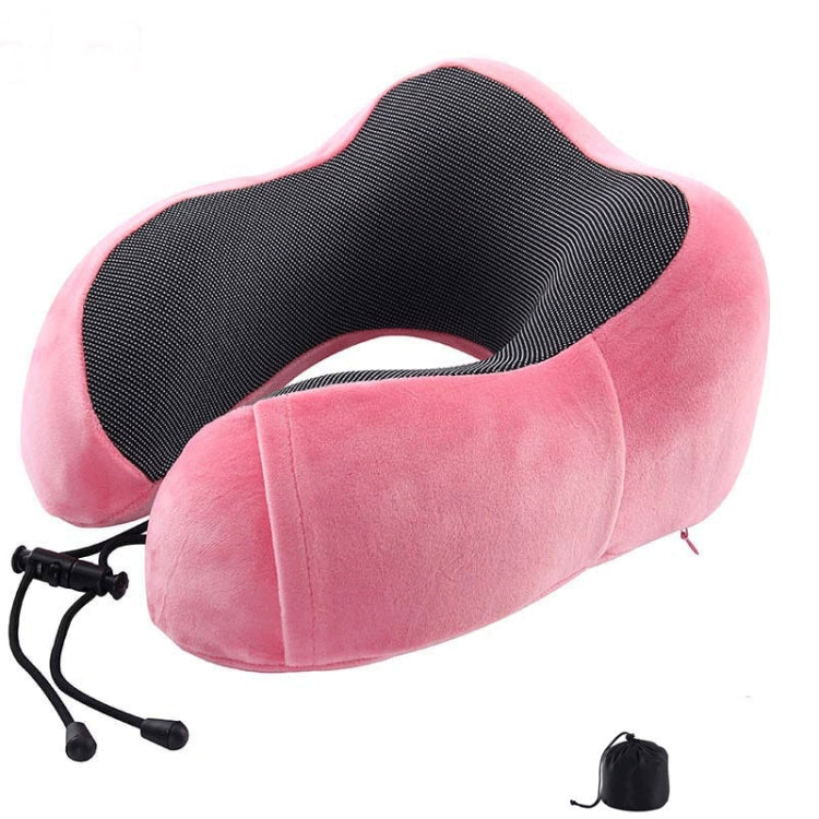 Pink U-shaped memory foam travel pillow with dark center panel and adjustable cords