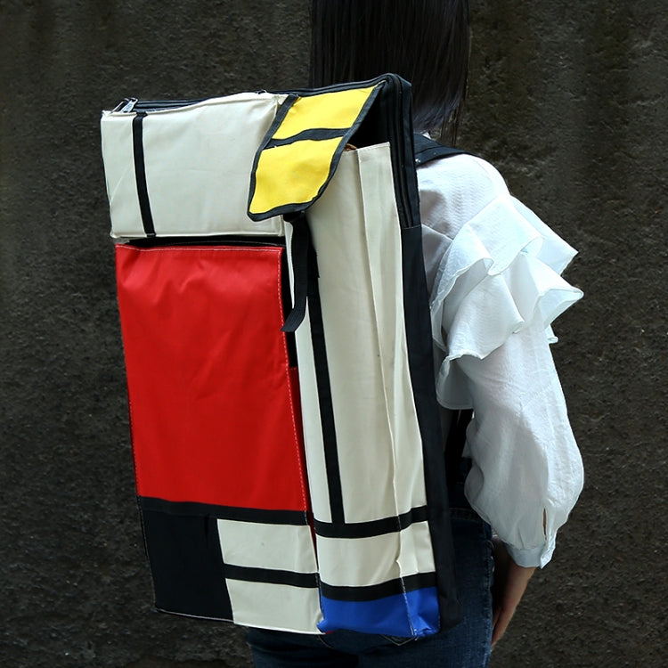 Portable sketchpad drawing bag with colorful panels and shoulder strap, folded cover.
