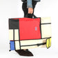 Large portable sketchpad drawing bag, red and cream with black trim and carry handles.
