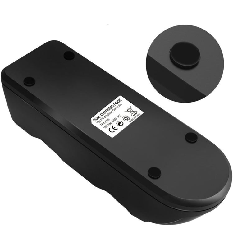 Black charger cradle underside with USB power port and instruction sticker