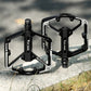 Bicycle platform pedals with black-and-silver metal frames and threaded axle posts