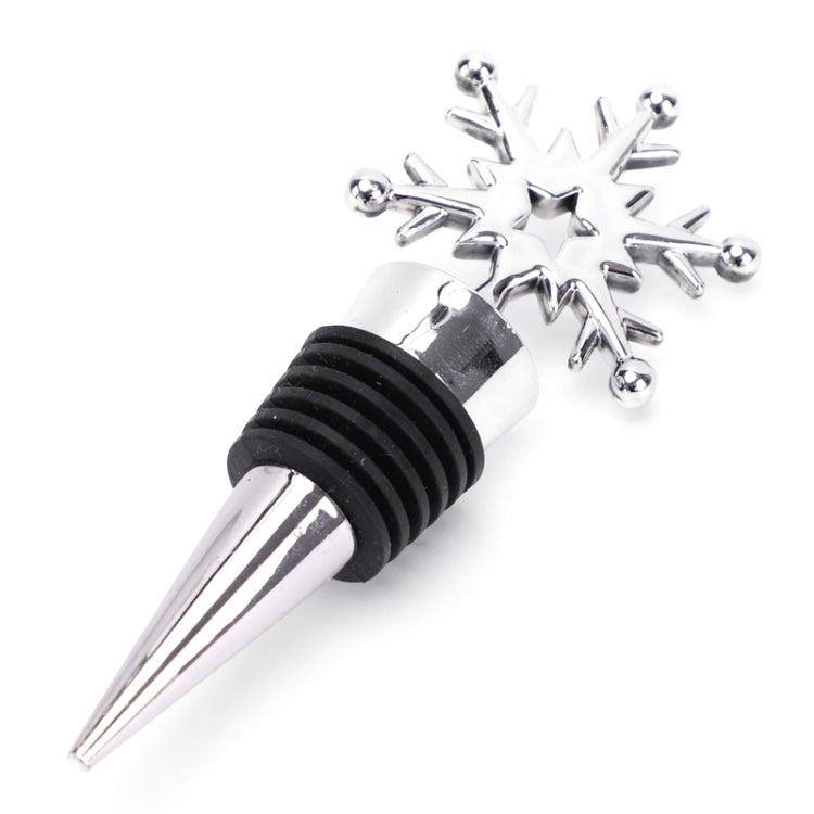 Snowflake champagne stopper with chrome cap and black rubber sealing ring