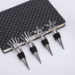 Set of snowflake champagne stoppers on display card, chrome tops with black rubber rings
