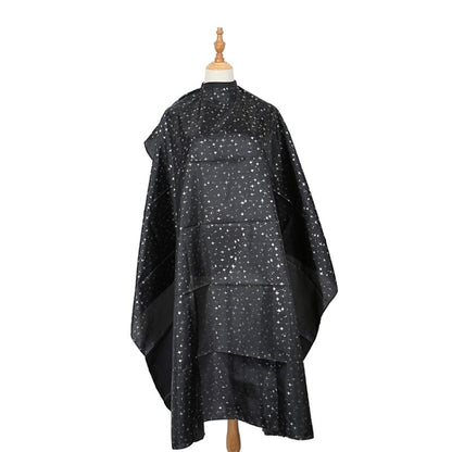 Black salon hair-dye cape with star speckle pattern, snap closure and full coverage