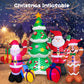 Inflatable Christmas yard decorations with green tree, Santa, and gingerbread man figures