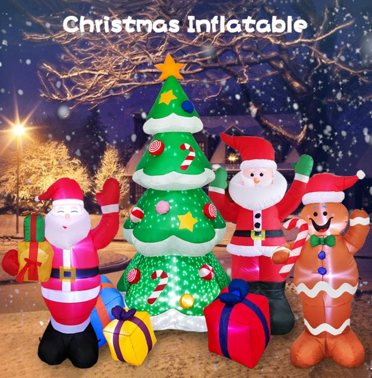 Inflatable Christmas yard decorations with green tree, Santa, and gingerbread man figures