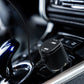 Dual USB car charger connected in car dashboard with charging cable