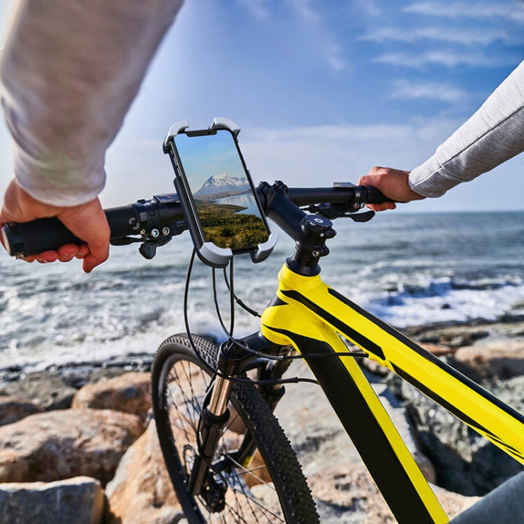 Bike handlebar phone holder bracket with a portrait phone mounted on the handlebar
