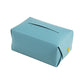 Light blue car leather tissue box holder with front dispensing slot and gold button detail