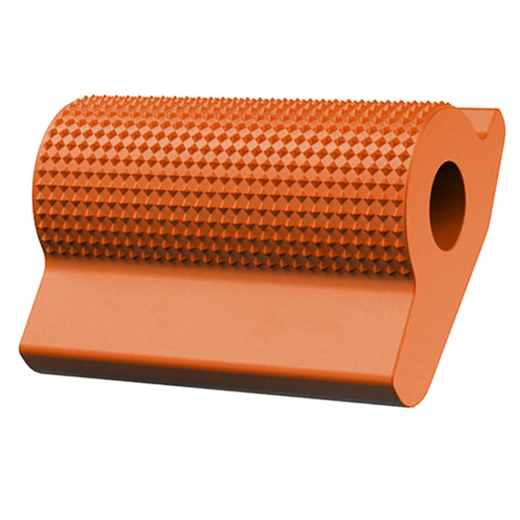 Orange textured motorcycle gear shift cover with circular mounting hole