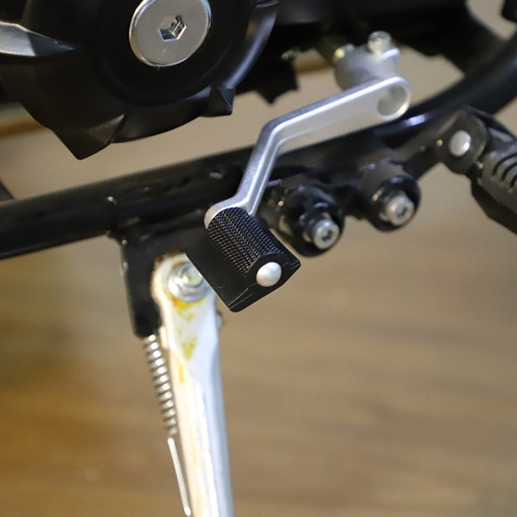 Textured motorcycle foot lever pad